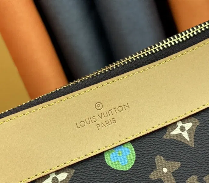 Louis Vuitton Monogram Craggy Voyage Souple Pochette In Chocolate — image 8