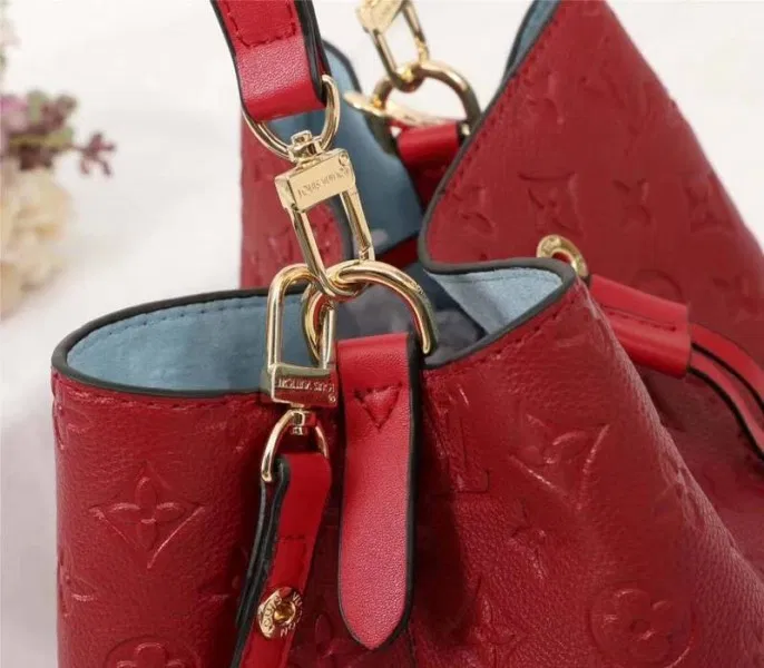 Louis Vuitton Monogram Empreinte NeoNoe MM Bag In Red — image 8