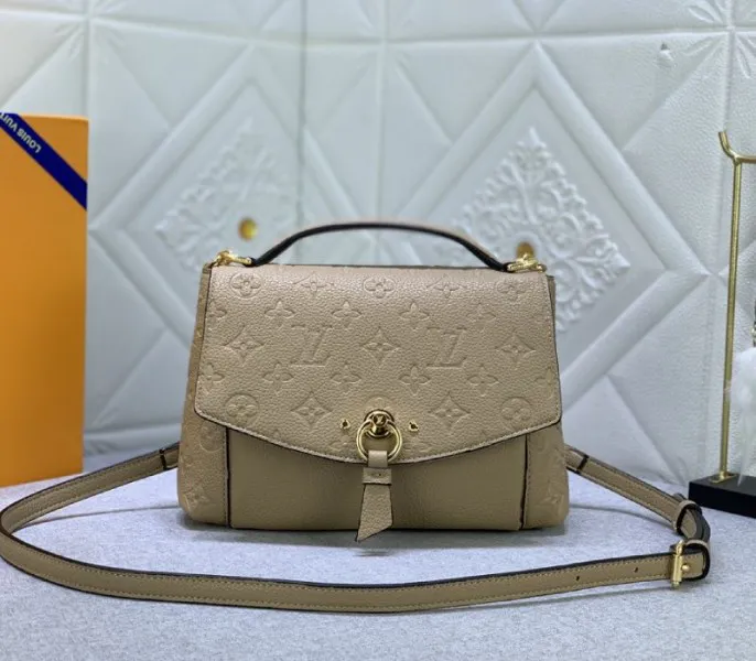 Louis Vuitton Monogram Empreinte Leather Blanche BB Handbag In Beige