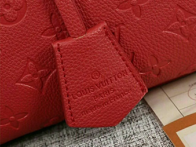 Louis Vuitton Monogram Empreinte Speedy Bandouliere 25 Handbag In Red — image 9