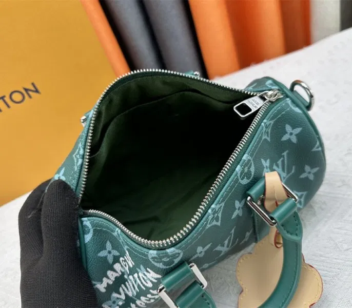 Louis Vuitton Monogram Heritage Canvas Keepall Bandouliere 25 In Green — image 6