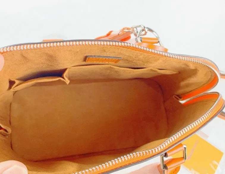 Louis Vuitton Epi Leather Alma PM Handbag In Orange With Jacquard Strap — image 5