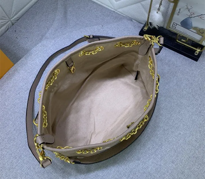 Louis Vuitton Bicolor Monogram Empreinte Bundle Bag In Tourterelle Gray and Cream — image 6