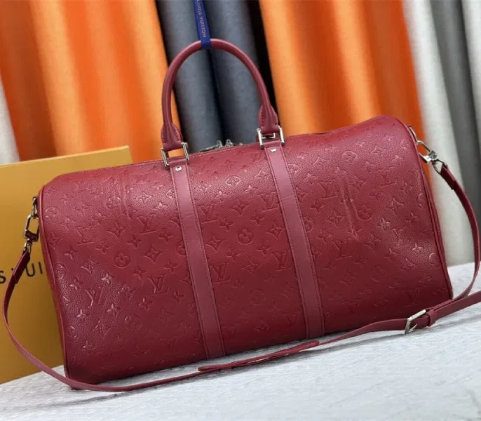 Louis Vuitton Taurillon Leather Keepall Bandouliere 50 In Sari Red — image 3