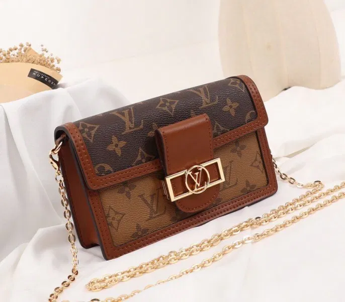Louis Vuitton Monogram Reverse Canvas Dauphine Chain Wallet — image 2