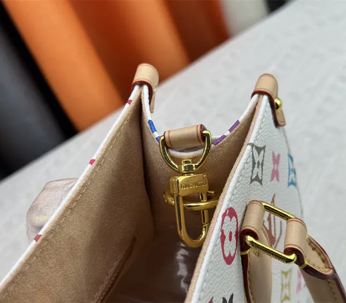 Louis Vuitton X TM Multicolored Onthego PM In White — image 9