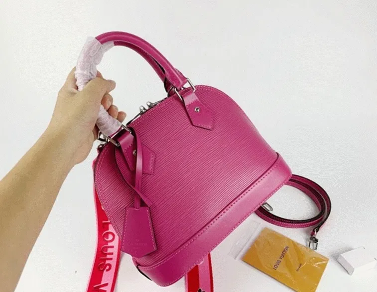Louis Vuitton Epi Leather Alma BB Handbag In Pondichery Pink With Jacquard Strap — image 9