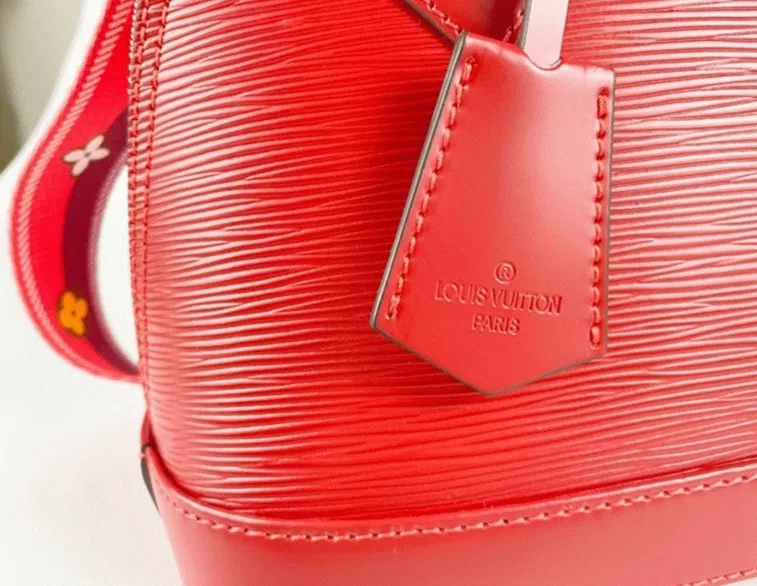 Louis Vuitton Epi Leather Alma BB Handbag In Red With Jacquard Strap — image 8