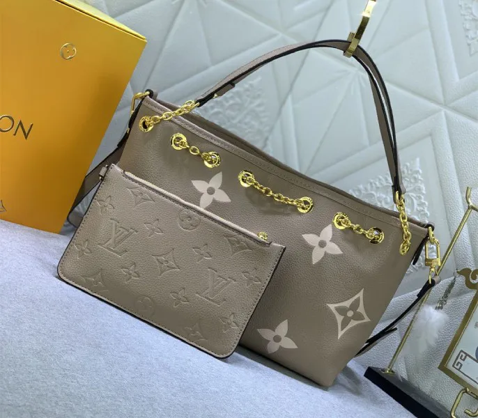 Louis Vuitton Bicolor Monogram Empreinte Bundle Bag In Tourterelle Gray and Cream — image 2