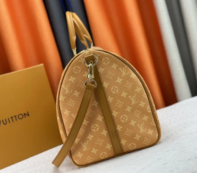 Louis Vuitton Monogram Heritage Canvas Keepall Bandouliere 55 In Yellow — image 3