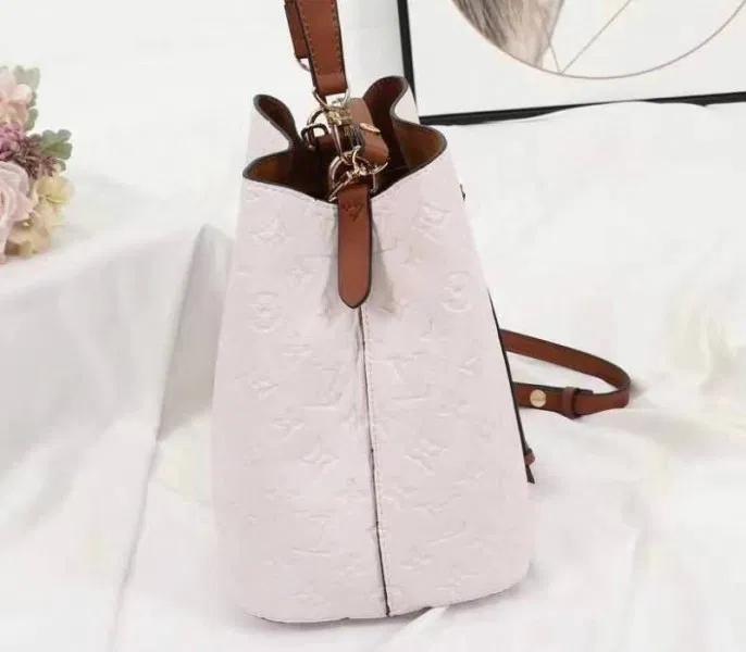 Louis Vuitton Monogram Empreinte NeoNoe MM Bag In Cream — image 4