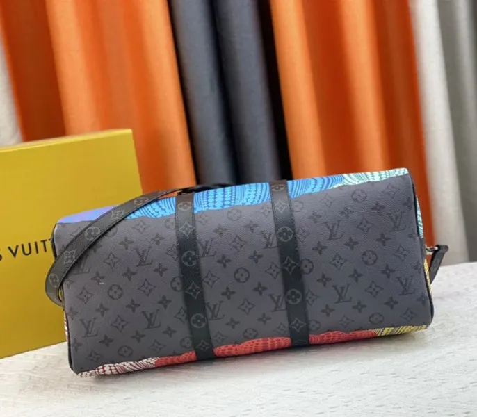 Louis Vuitton X YK Monogram Eclipse Reverse Keepall 45 Luggage In Pumpkin — image 3