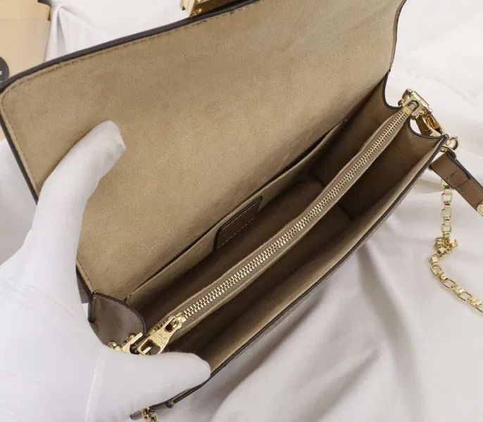 Louis Vuitton Monogram Empreinte Dauphine Bag In Brown — image 5