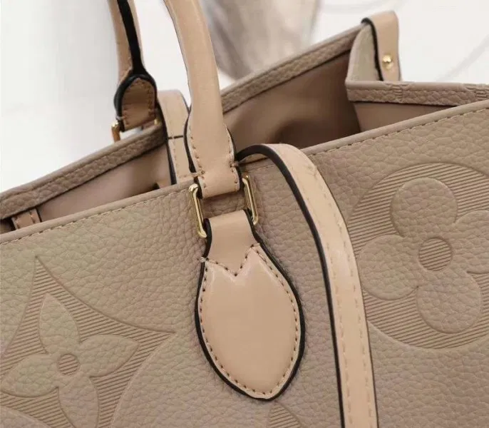 Louis Vuitton Monogram Empreinte Giant Onthego GM Tote In Beige — image 7