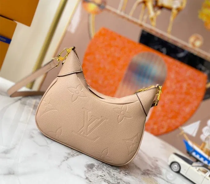 Louis Vuitton Monogram Empreinte Leather Bagatelle Mini Hobo In Beige — image 2