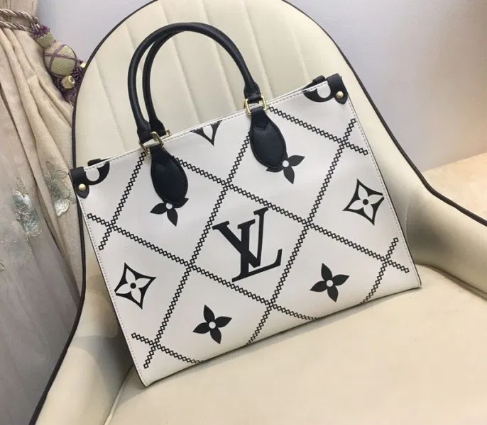 Louis Vuitton Spring 2022 Monogram Empreinte Onthego MM Tote In Cream