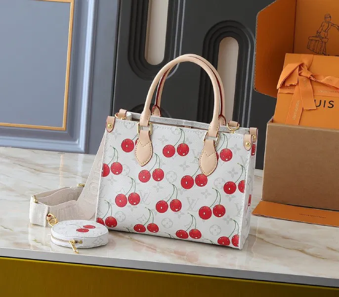 LV X TM Monogram Cherry Canvas Onthego PM In White