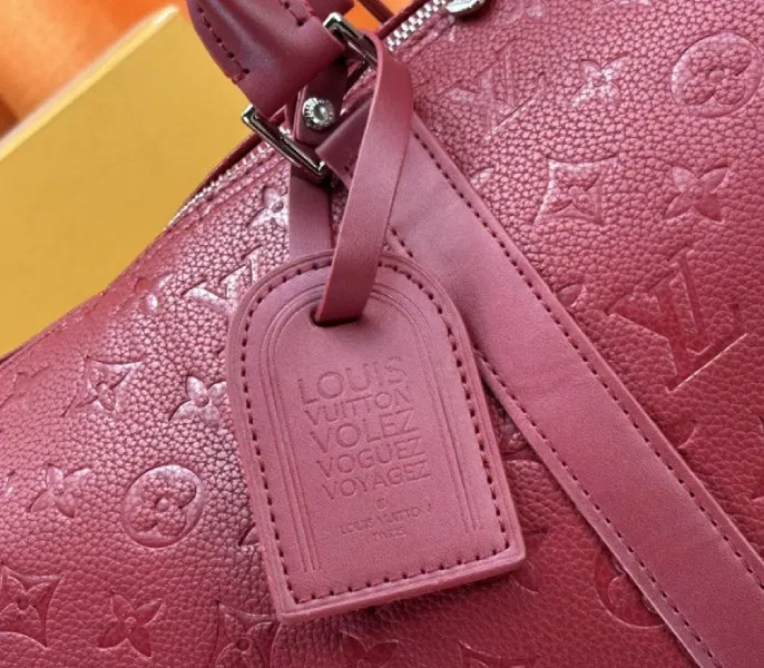 Louis Vuitton Taurillon Leather Keepall Bandouliere 50 In Sari Red — image 9