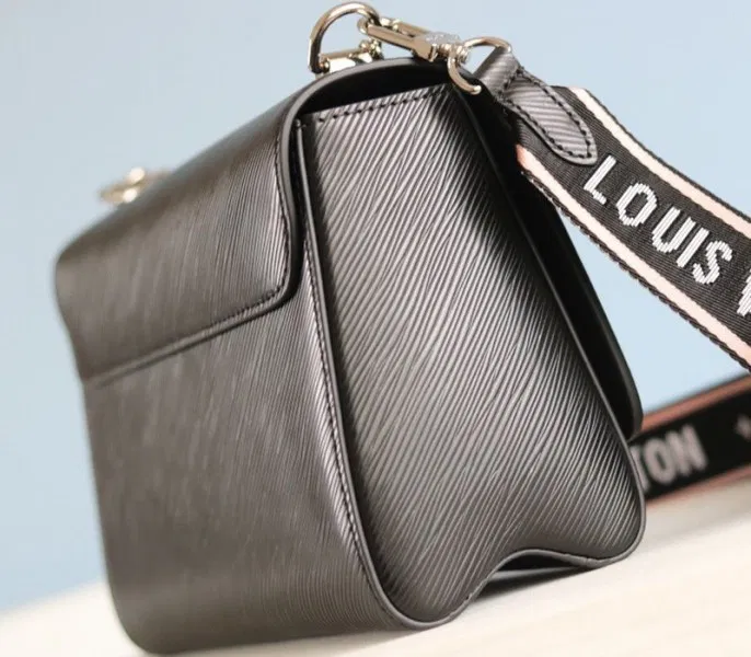 Louis Vuitton Monogram Empreinte Bold Printed Pattern Twist MM Bag In Black — image 6