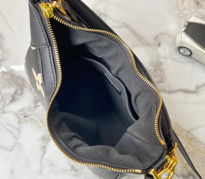 Louis Vuitton Bicolor Monogram Empreinte Leather Bagatelle Mini Hobo In Black — image 5