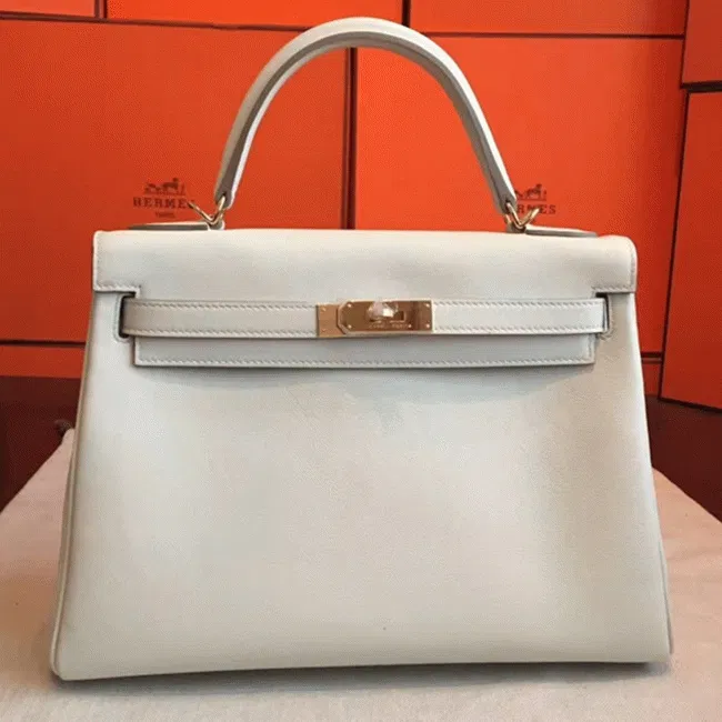 Ivory Swift Hermes Kelly Retourne 32cm Refined Purse