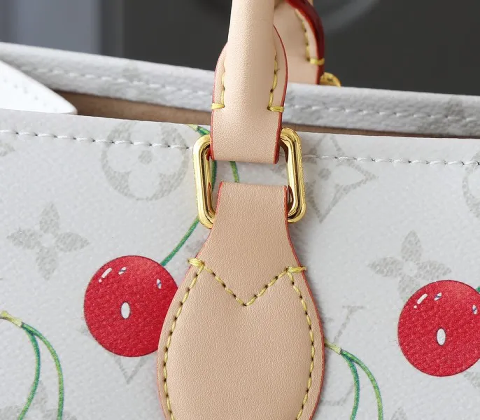 X TM Monogram Cherry Canvas Onthego MM In White Style 1 — image 9