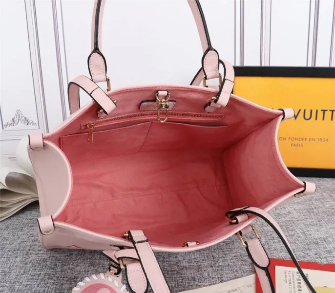 Louis Vuitton Monogram Empreinte Leather Onthego MM Bag In Pink — image 6