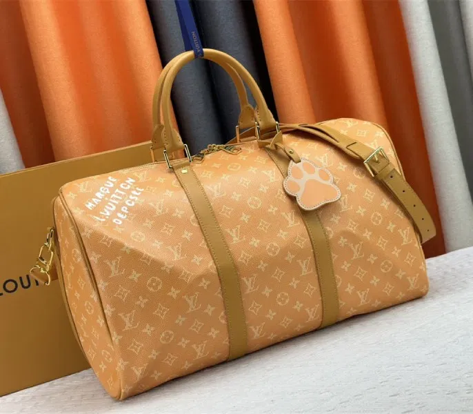 Louis Vuitton Monogram Heritage Canvas Keepall Bandouliere 45 In Yellow — image 2