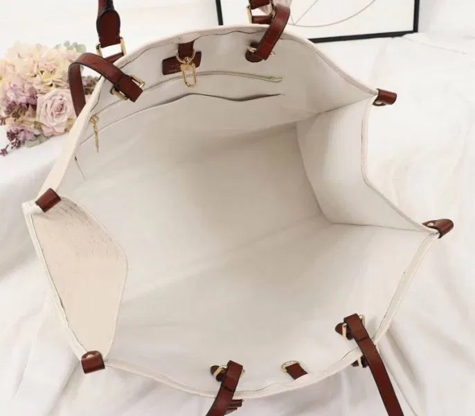 Louis Vuitton Monogram Empreinte Onthego GM Tote In Cream — image 5