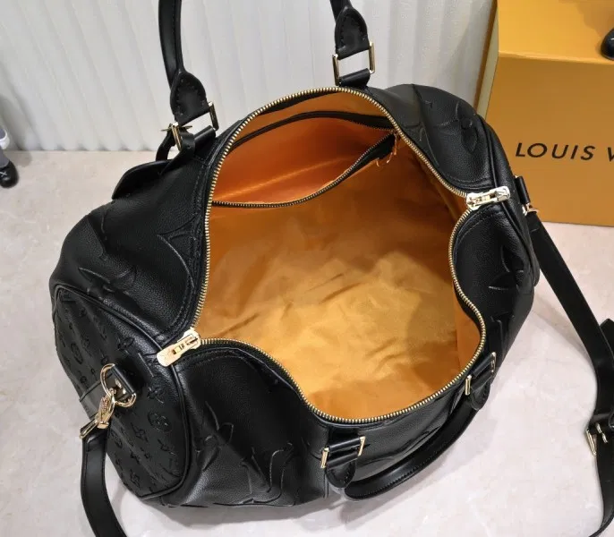 LV Monogram Empreinte Keepall Bandouliere 45 In Black — image 4
