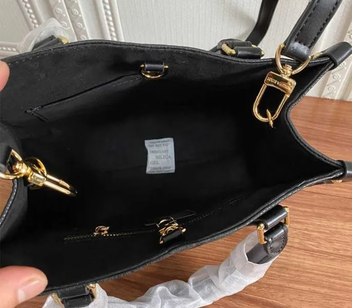 Louis Vuitton Monogram Empreinte Leather Onthego PM Bag In Black — image 6