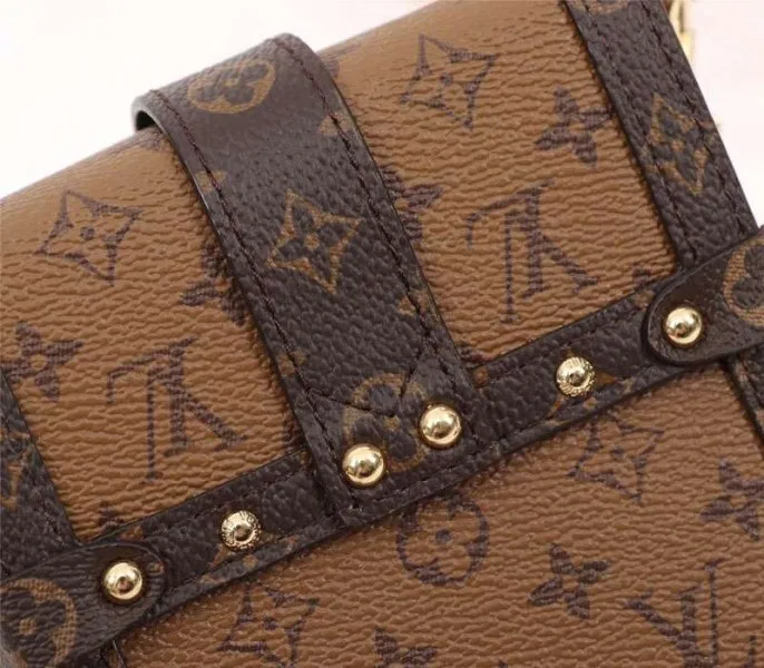 Louis Vuitton Monogram Reverse Canvas Vertical Trunk Pochette — image 9