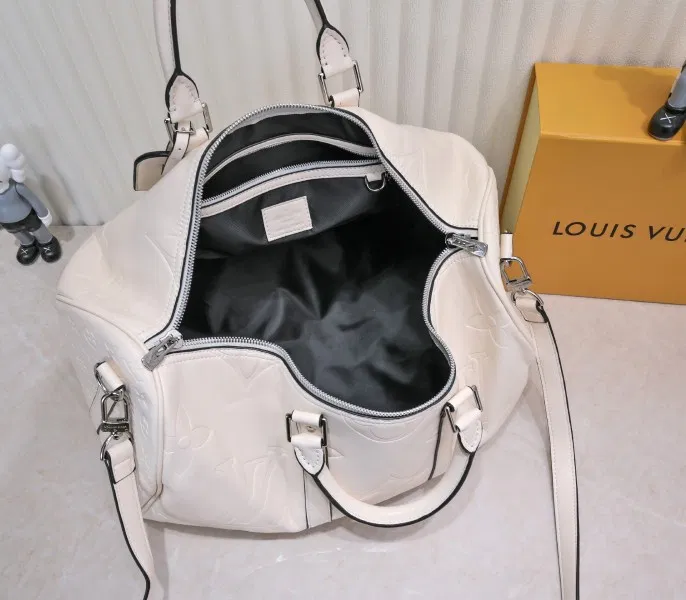 LV Monogram Empreinte Keepall Bandouliere 45 In Cream — image 4