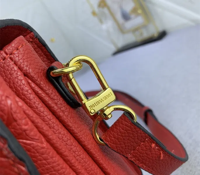 LV Monogram Empreinte Leather Metis In Red — image 8