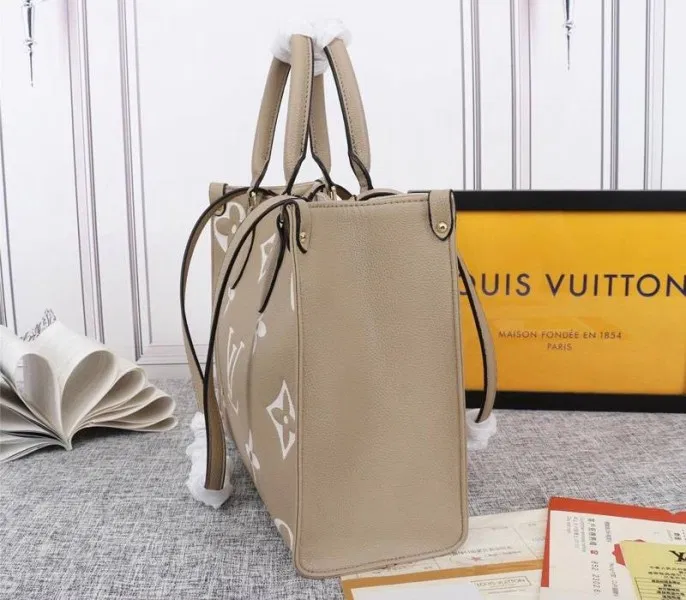 Louis Vuitton Monogram Empreinte OnTheGo MM Tote In Tourterelle Gray — image 3