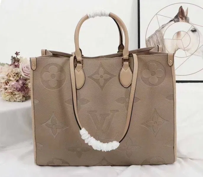 Louis Vuitton Monogram Empreinte Giant Onthego GM Tote In Beige