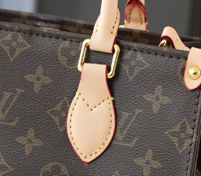 X TM Monogram Canvas Onthego PM — image 9
