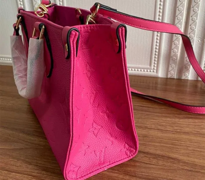 Louis Vuitton Monogram Empreinte Leather Onthego PM Bag In Freesia Pink — image 5