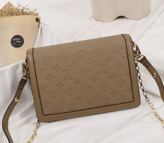 Louis Vuitton Monogram Empreinte Dauphine Bag In Brown — image 7