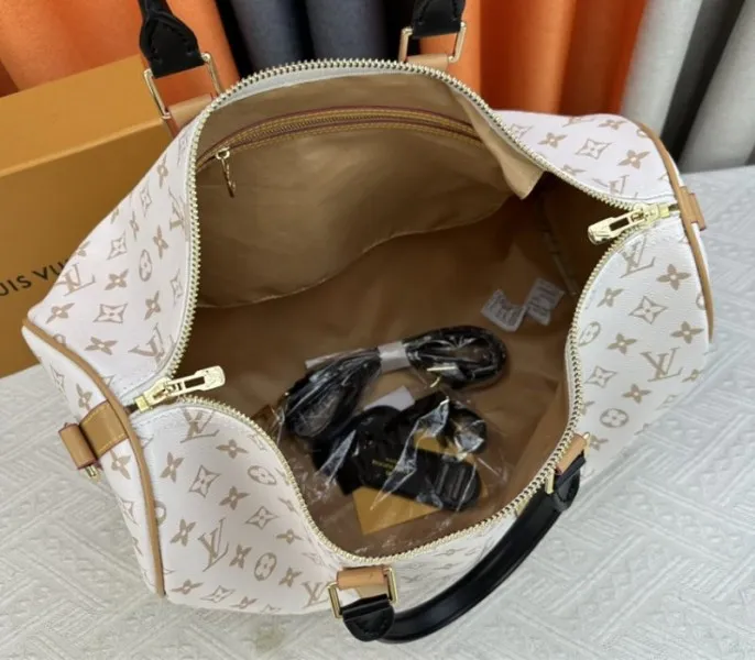 Louis Vuitton Monogram Dune Keepall Bandouliere 45 Travel Bag — image 6