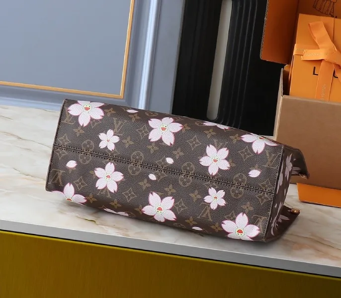 X TM Monogram Canvas Onthego MM With Cherry Blossom — image 4