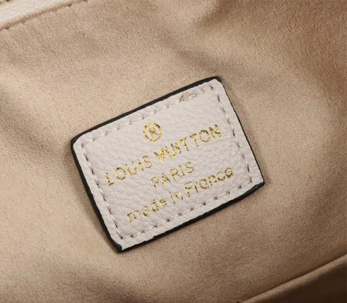 Louis Vuitton Monogram Empreinte Leather Maida Hobo In Cream — image 6