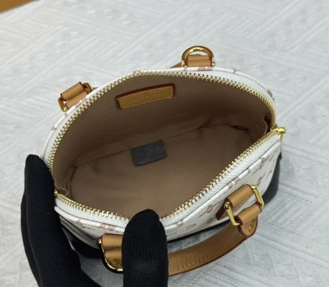 Louis Vuitton Monogram Dune Canvas Nano Alma Bag — image 4