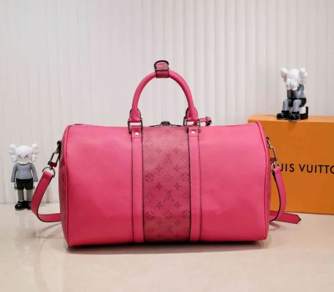 Louis Vuitton Taiga Leather Keepall Bandouliere 50 Travel Bag In Pink — image 3