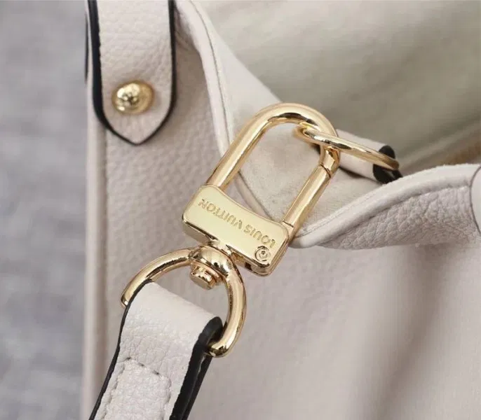 Louis Vuitton Bicolor Monogram Empreinte Leather Onthego PM Bag In Cream And Bois De Rose Pink — image 6