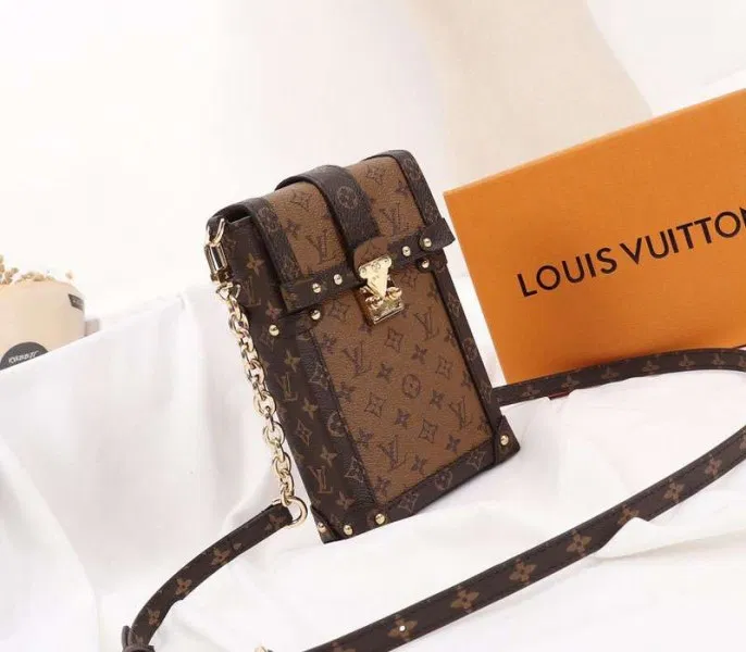 Louis Vuitton Monogram Reverse Canvas Vertical Trunk Pochette — image 2