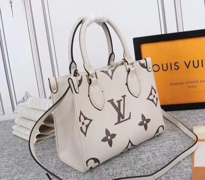 Louis Vuitton Bicolor Monogram Empreinte Leather Onthego PM Bag In Cream And Bois De Rose Pink — image 2
