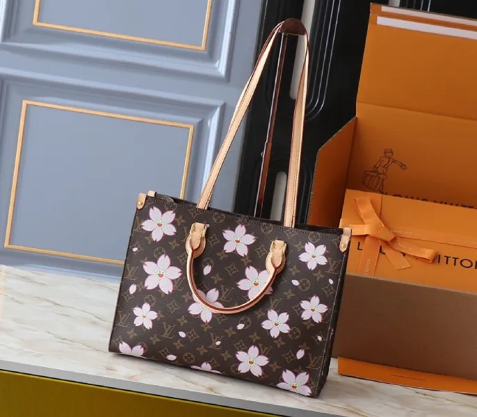 X TM Monogram Canvas Onthego MM With Cherry Blossom — image 2