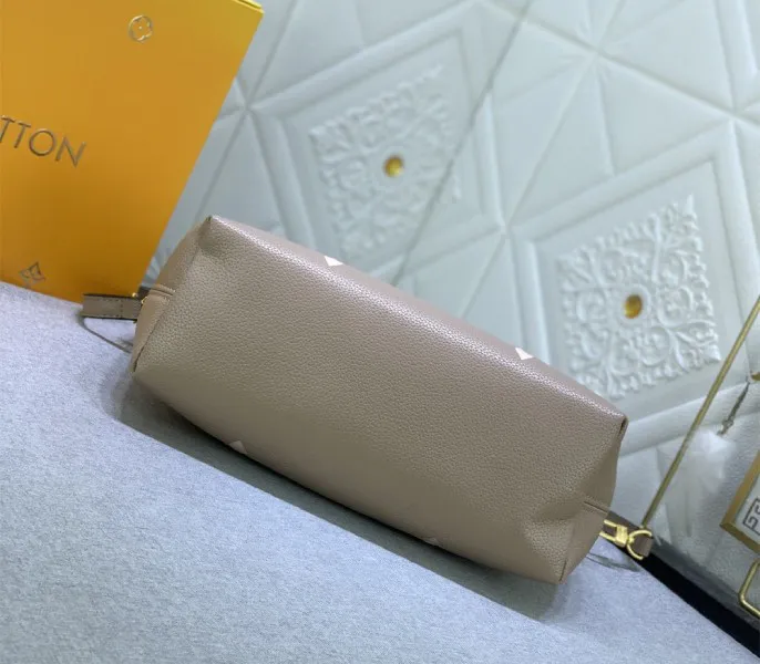 Louis Vuitton Bicolor Monogram Empreinte Bundle Bag In Tourterelle Gray and Cream — image 3