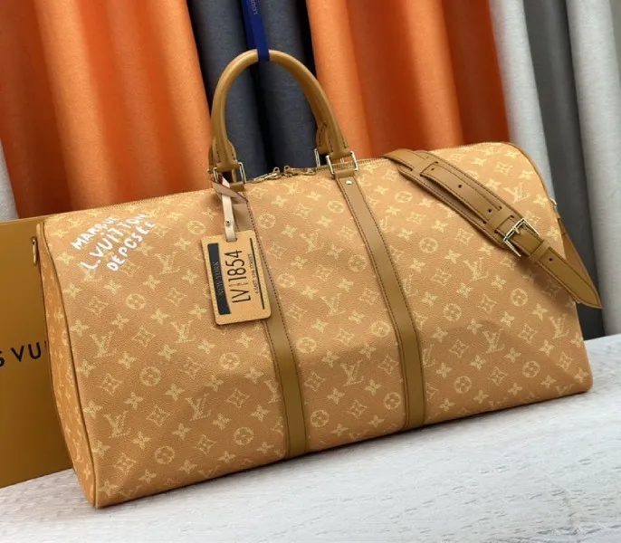 Louis Vuitton Monogram Heritage Canvas Keepall Bandouliere 55 In Yellow — image 2